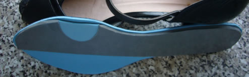Temporary insole with a cut-out of the 1st metatarsal head